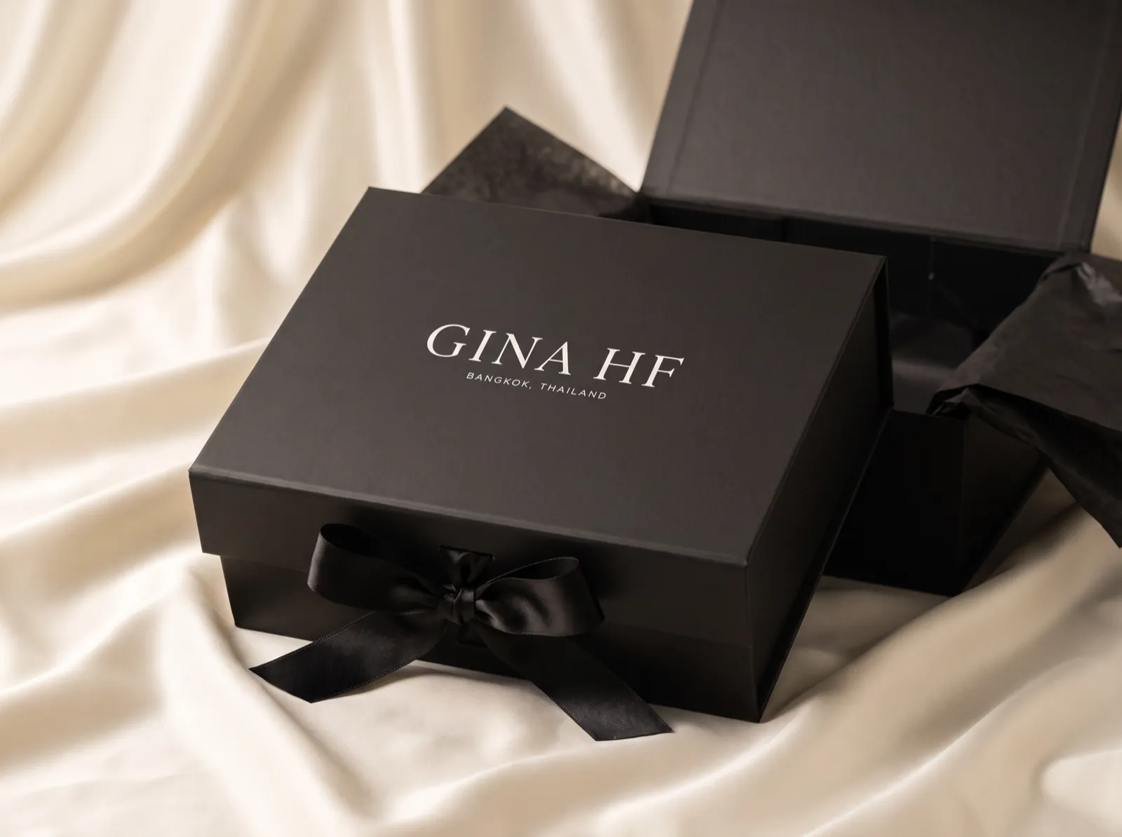 GINA HF — the Nocturne box, closed with a silk ribbon